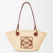 Loewe - « Petit panier Anagram en palmier Iraca et cuir de veau Natural Tan »