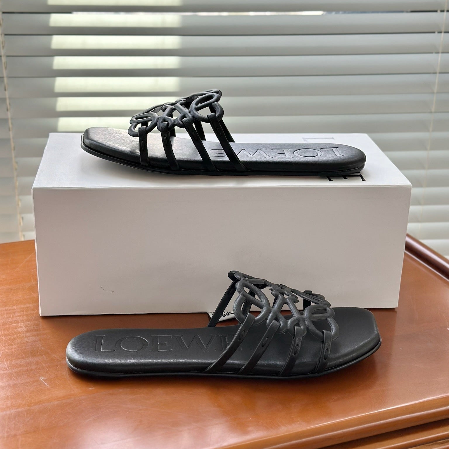 LOEWE - « Petal Anagram slide in soft calfskin Noire »