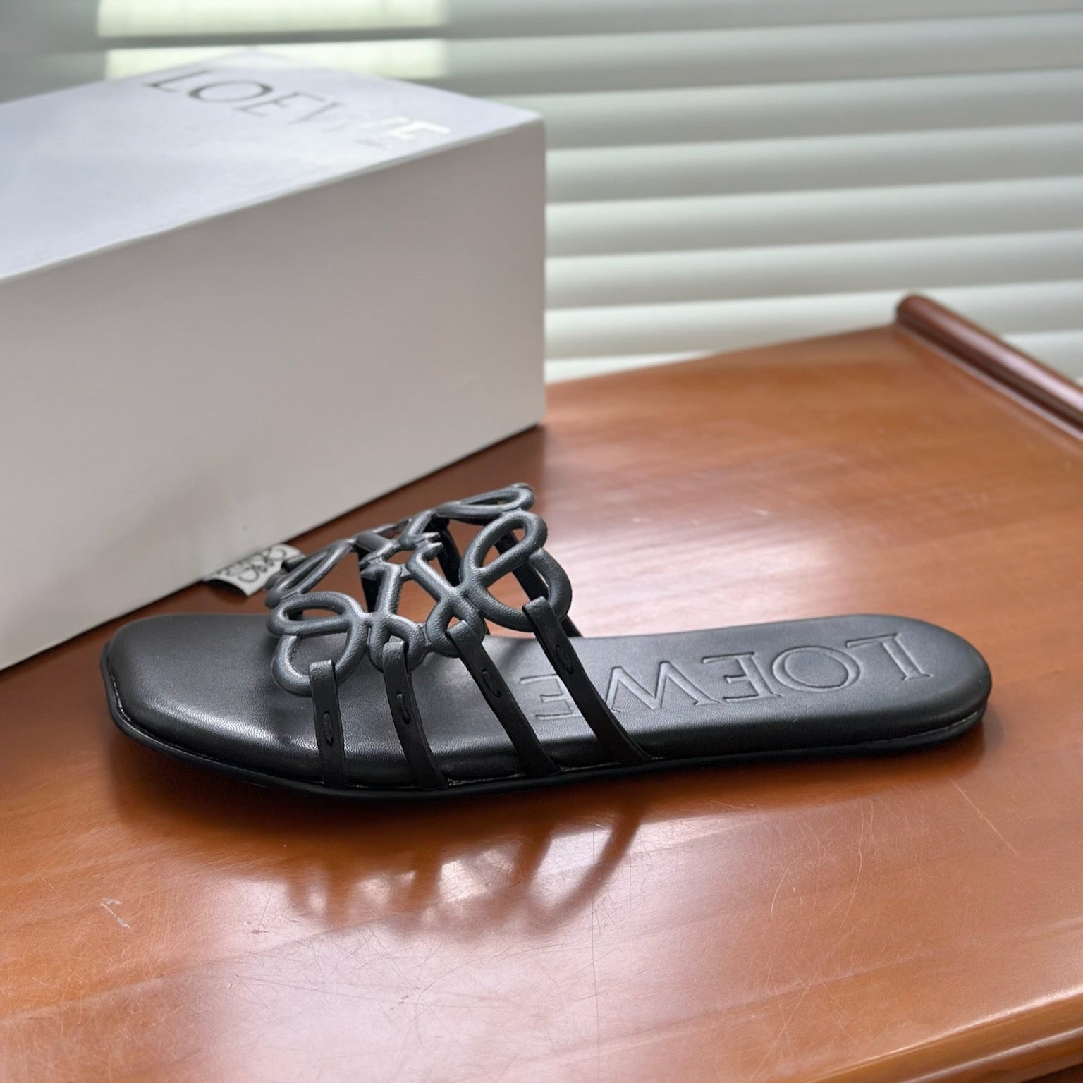 LOEWE - « Petal Anagram slide in soft calfskin Noire »