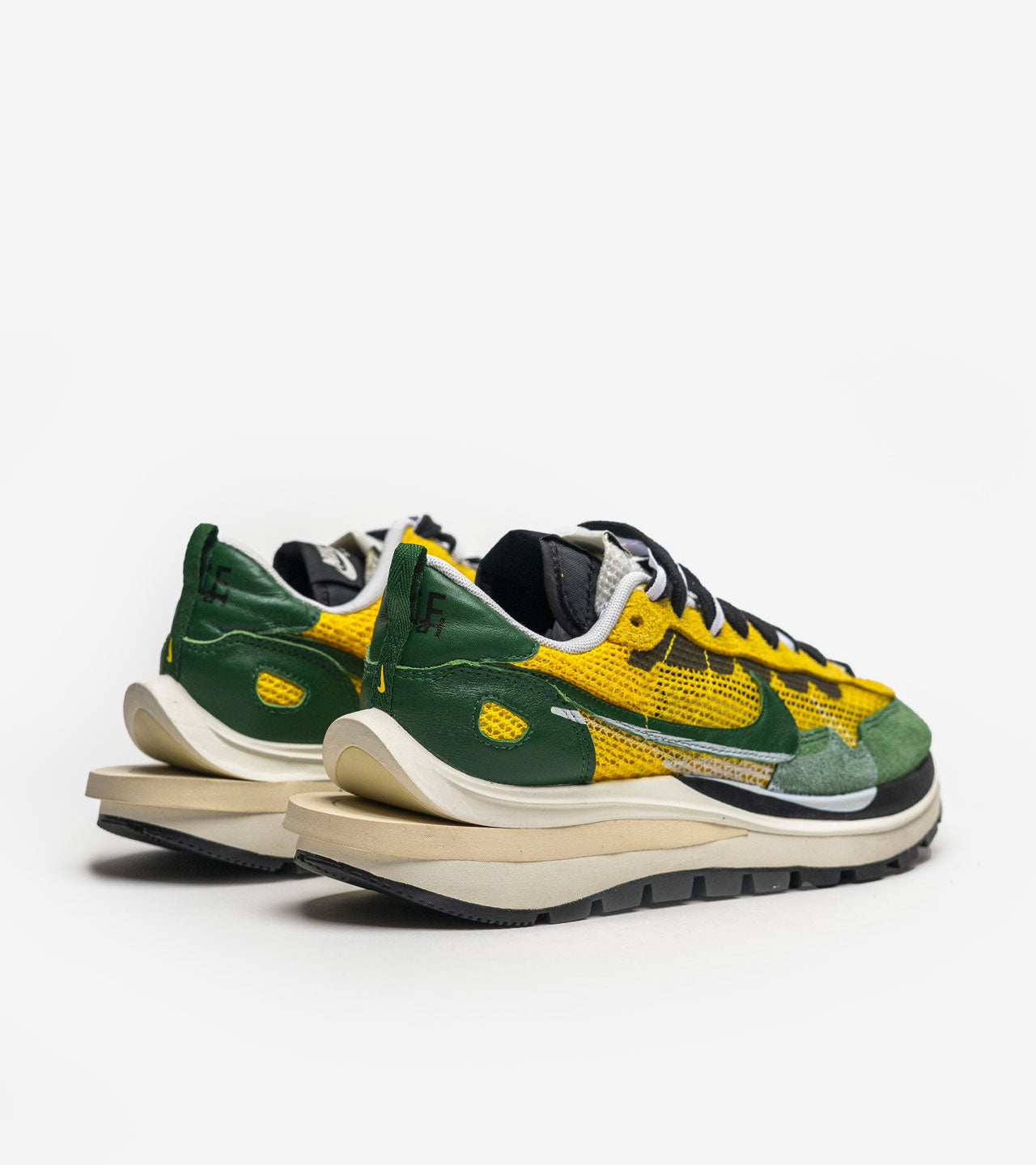 Nike Vaporwaffle « sacai Tour Yellow Stadium Green »