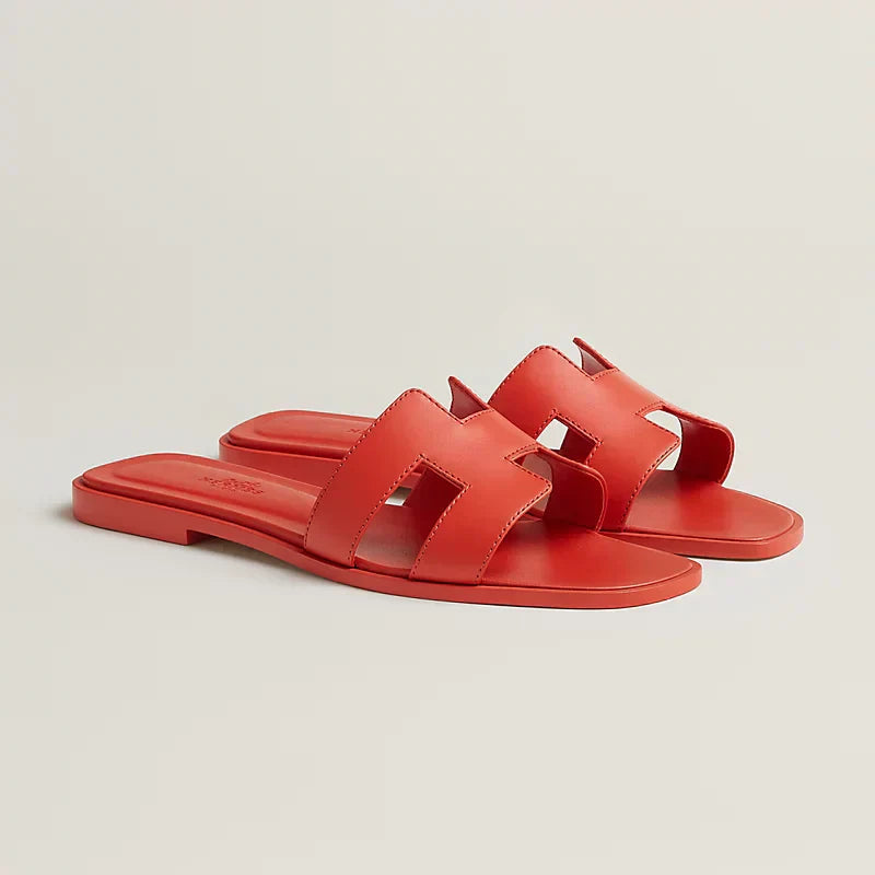 Hermes - « Claquettes Orange capucine »