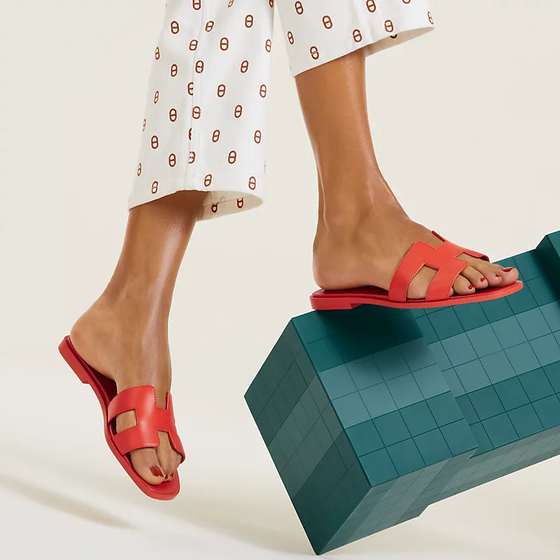 Hermes - « Claquettes Orange capucine »